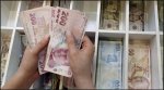 Turkey accuses US of 'stab in back' as currency woes persist.JPG